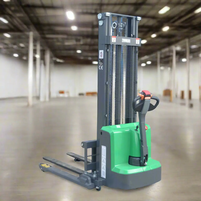 Green and gray forklift on a white background