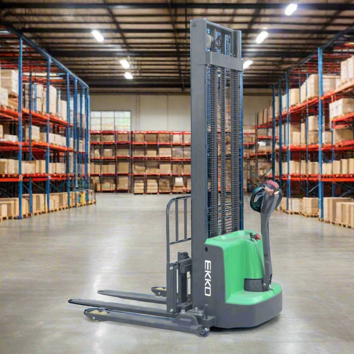 Green and gray forklift on a white background